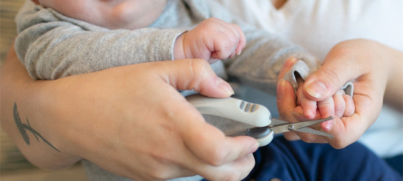 Infant's nails being clipped with Safe Squeeze Nail Scissors