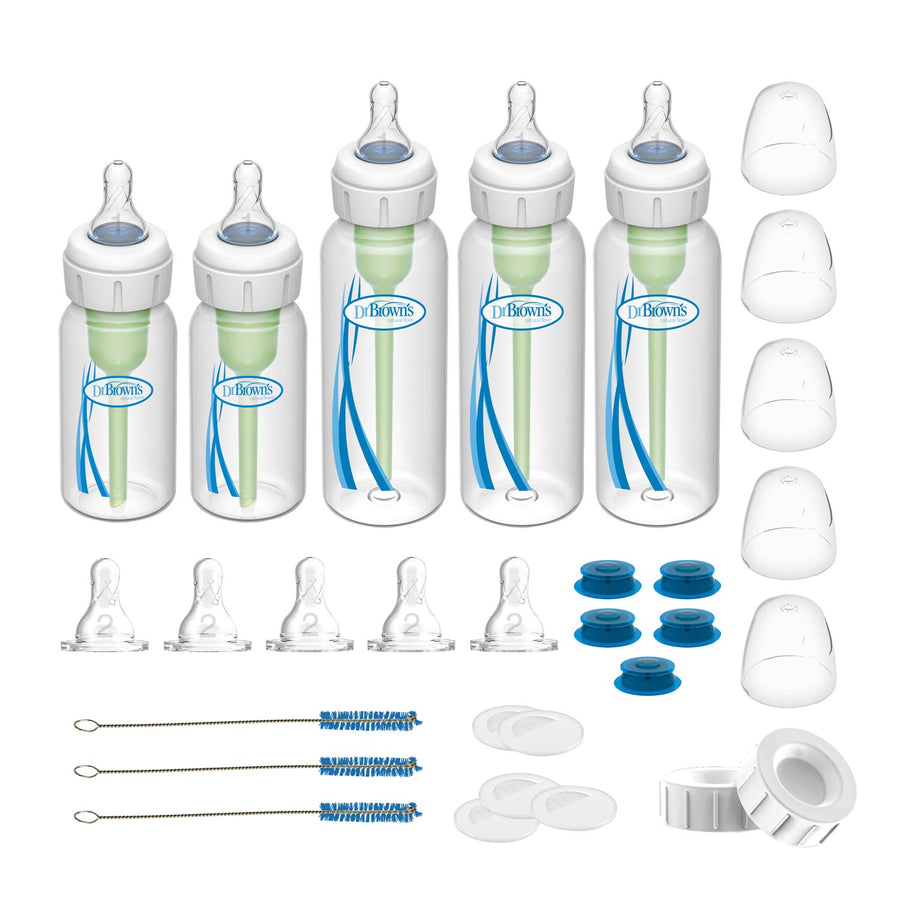 The Dr. Brown's Specialty Feeding System Starter Kit includes baby bottles with green vent inserts, five caps, silicone nipples, covers, blue rings, and cleaning brushes for optimal feeding and oral support.