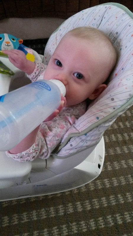 Cali drinking from Dr. Brown's bottle