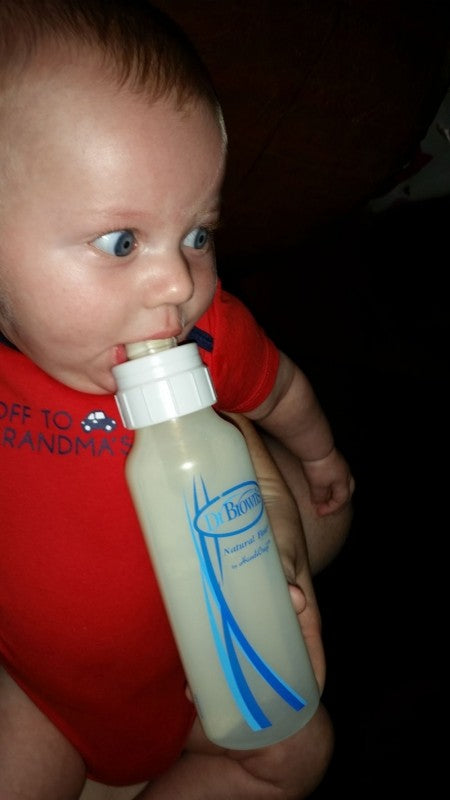 Charlie with Dr. Brown's bottle in mouth