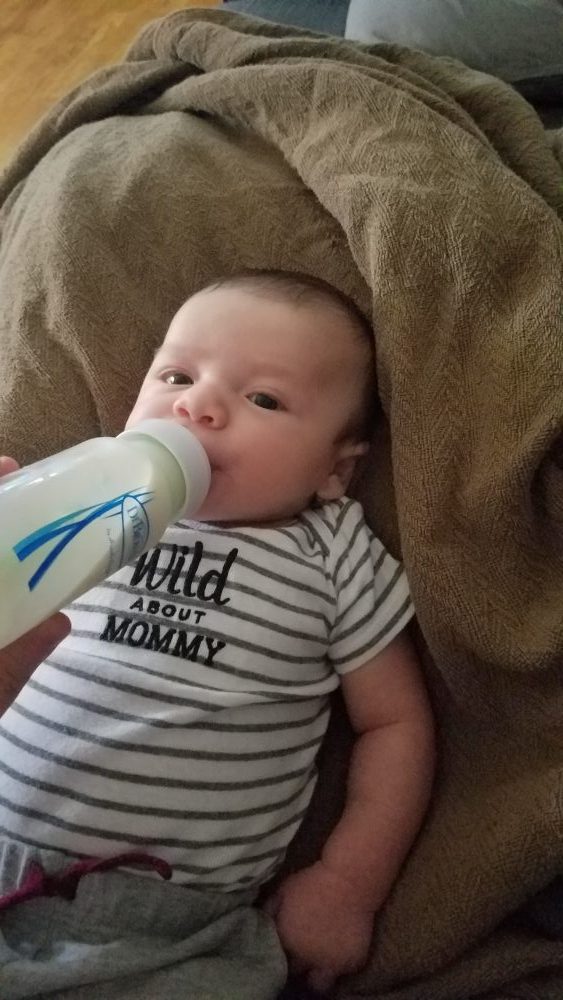 Benjamin drinking from Dr. Brown's bottle