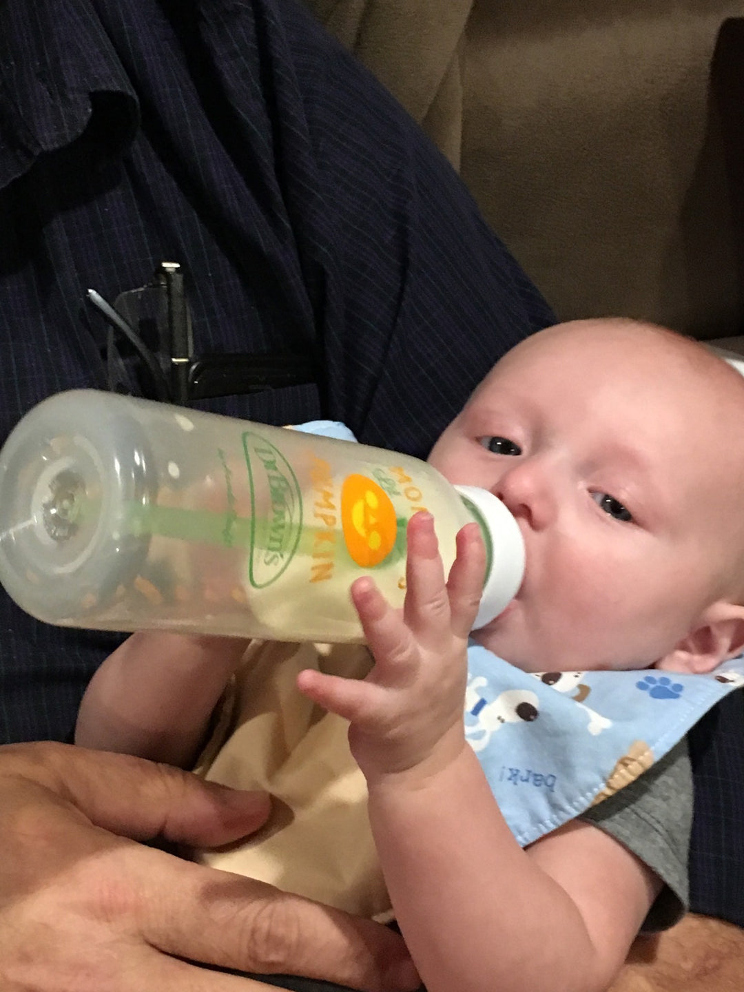 Zane drinking from Dr. Brown's bottle