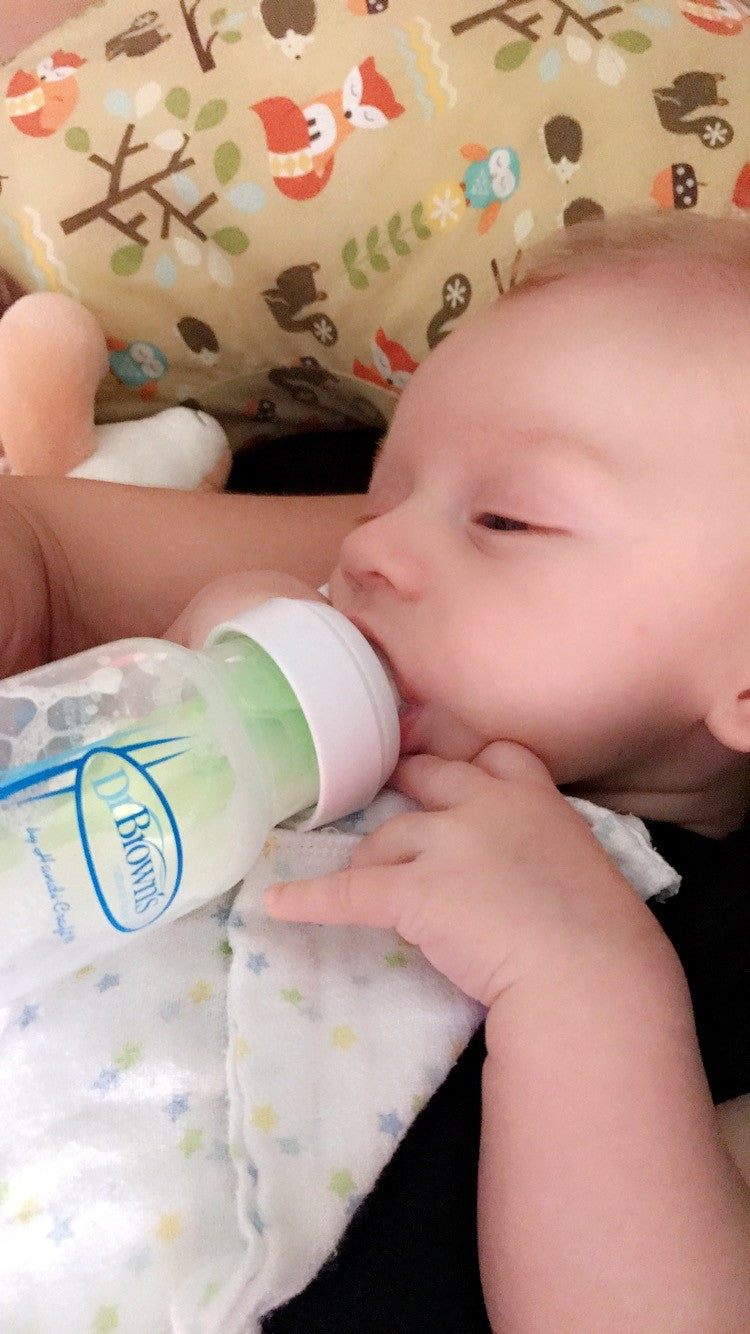 Chayton drinking from Dr. Brown's bottle