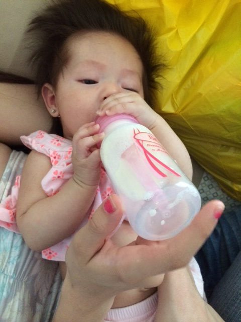 Jimena drinking from bottle