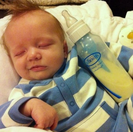 Tucker sleeping with Dr. Brown's bottle