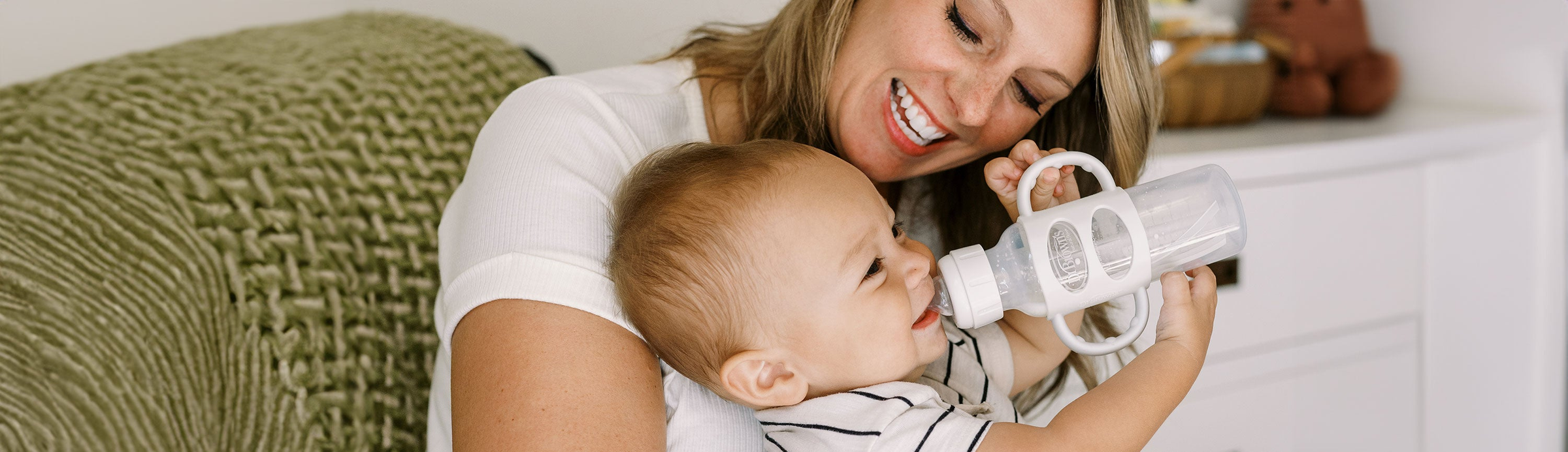 Mom and baby with Dr. Brown's Sippy Spout Bottle