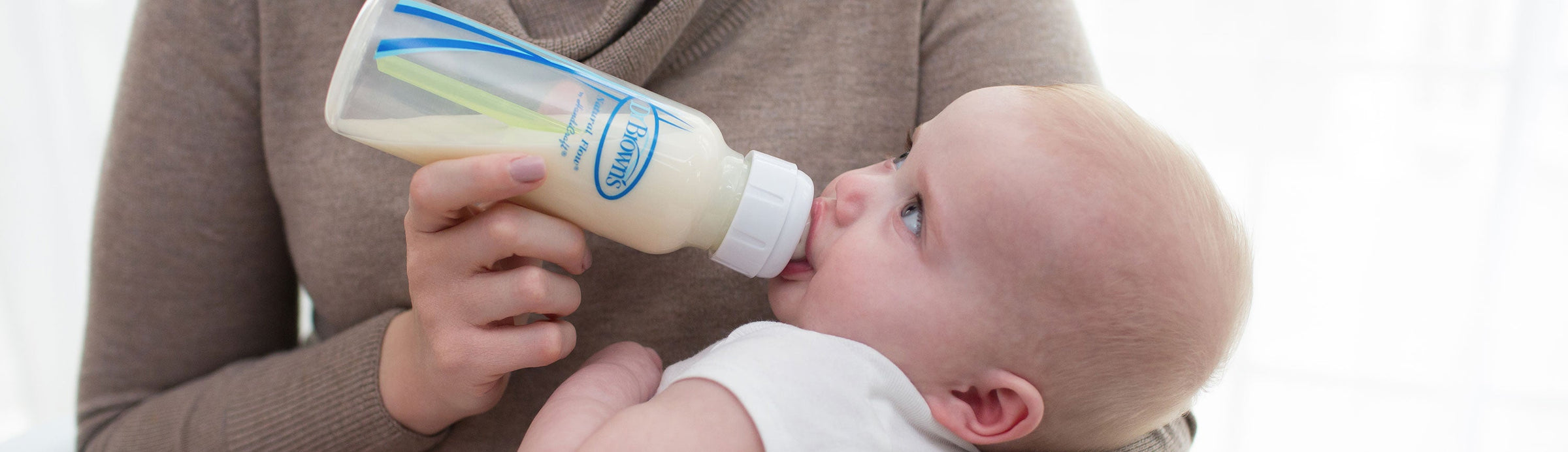 Dr. Brown's bottle feeding baby