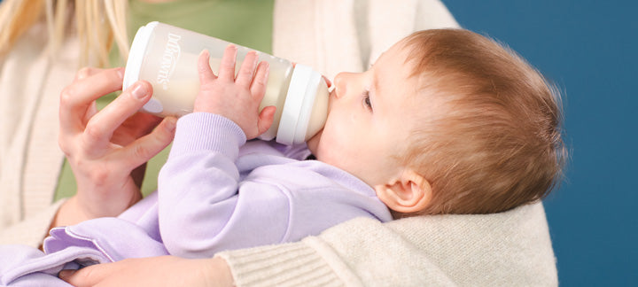 Baby being fed from a silicone baby bottle