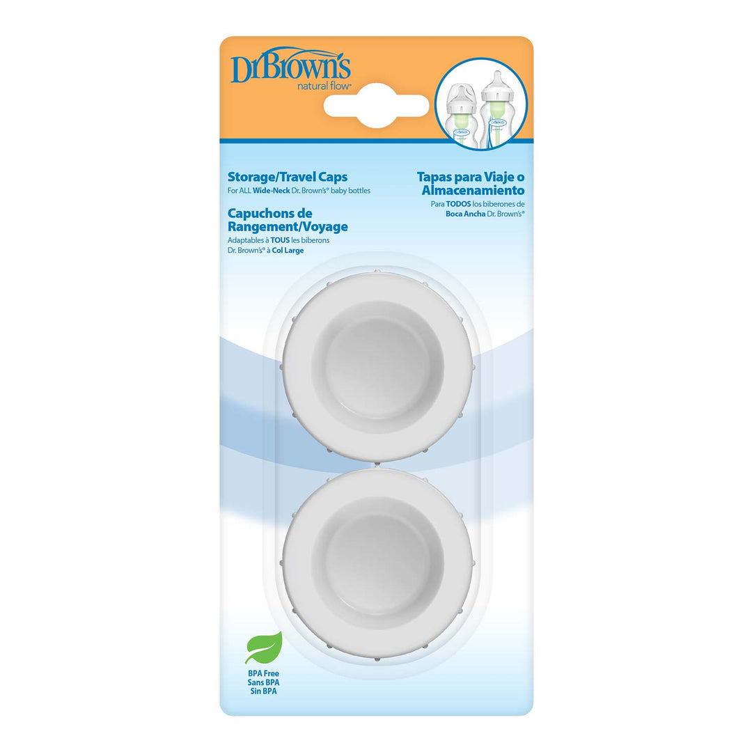 Dr. Brown’s Natural Flow® Storage/Travel Caps Wide-Neck 2-Pack includes two white caps in a clear blister pack with English, Spanish, and French text on a blue and orange label.