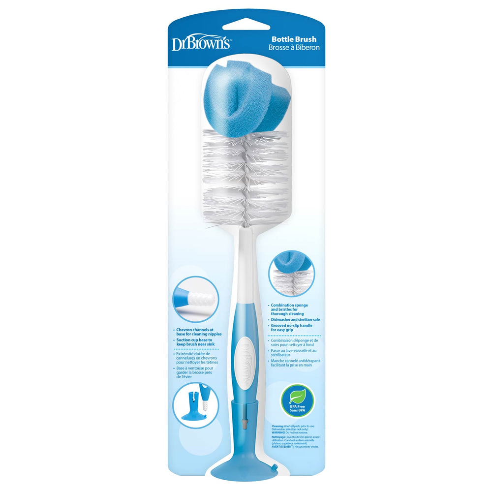 Dr. Brown’s Natural Flow® Baby Bottle Brush by Dr. Brown's has a blue and white handle, white bristles, a blue sponge tip, and comes vertically packed in clear plastic with product details.