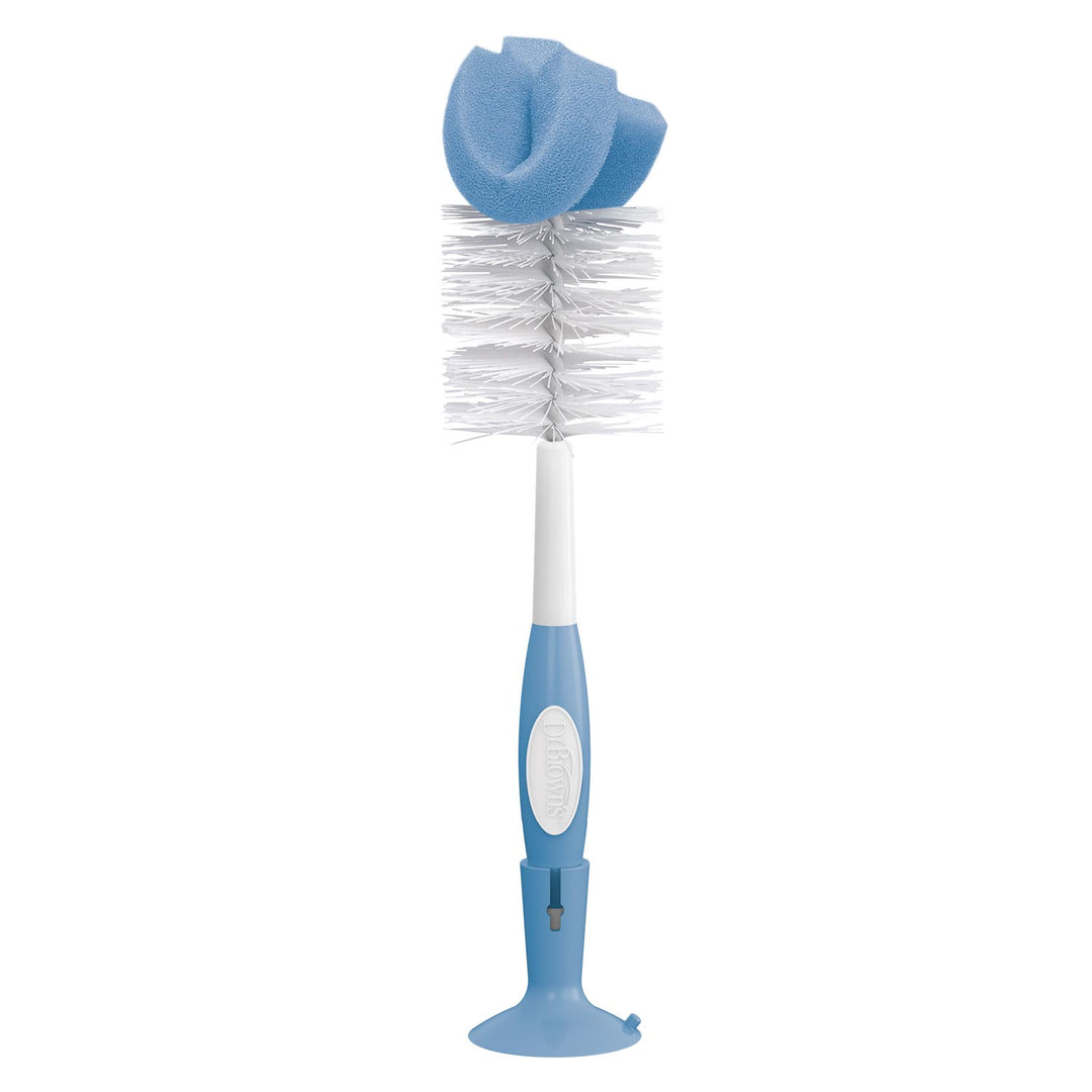 Dr. Brown's™ Baby Bottle Brush from Dr. Brown's features white bristles, a blue foam tip, blue and white handle with suction cup base, and a built-in nipple cleaner for thorough cleaning of baby bottles.