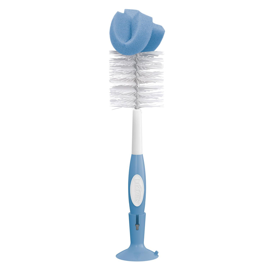 Dr. Brown's™ Baby Bottle Brush from Dr. Brown's features white bristles, a blue foam tip, blue and white handle with suction cup base, and a built-in nipple cleaner for thorough cleaning of baby bottles.