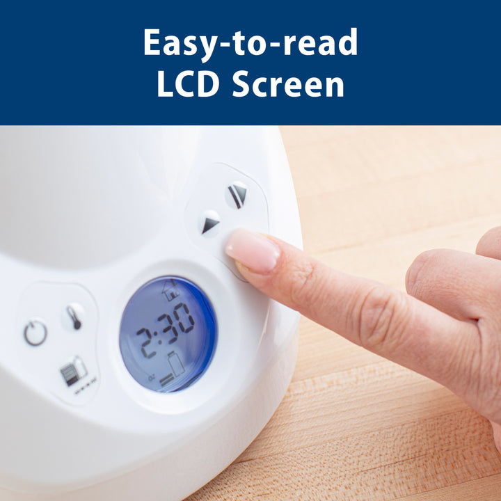 Bottle Warmer with an easy-to-read LCD screen, showing the time 2:30, on a wooden surface.