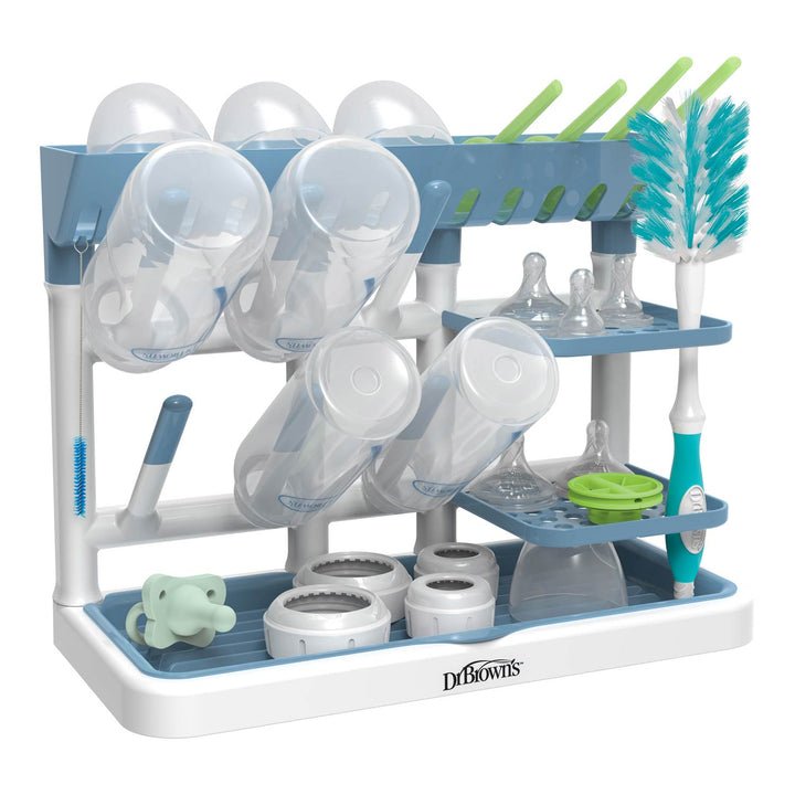 Dr. Brown's blue baby bottle drying rack with cups, bottles, and brushes