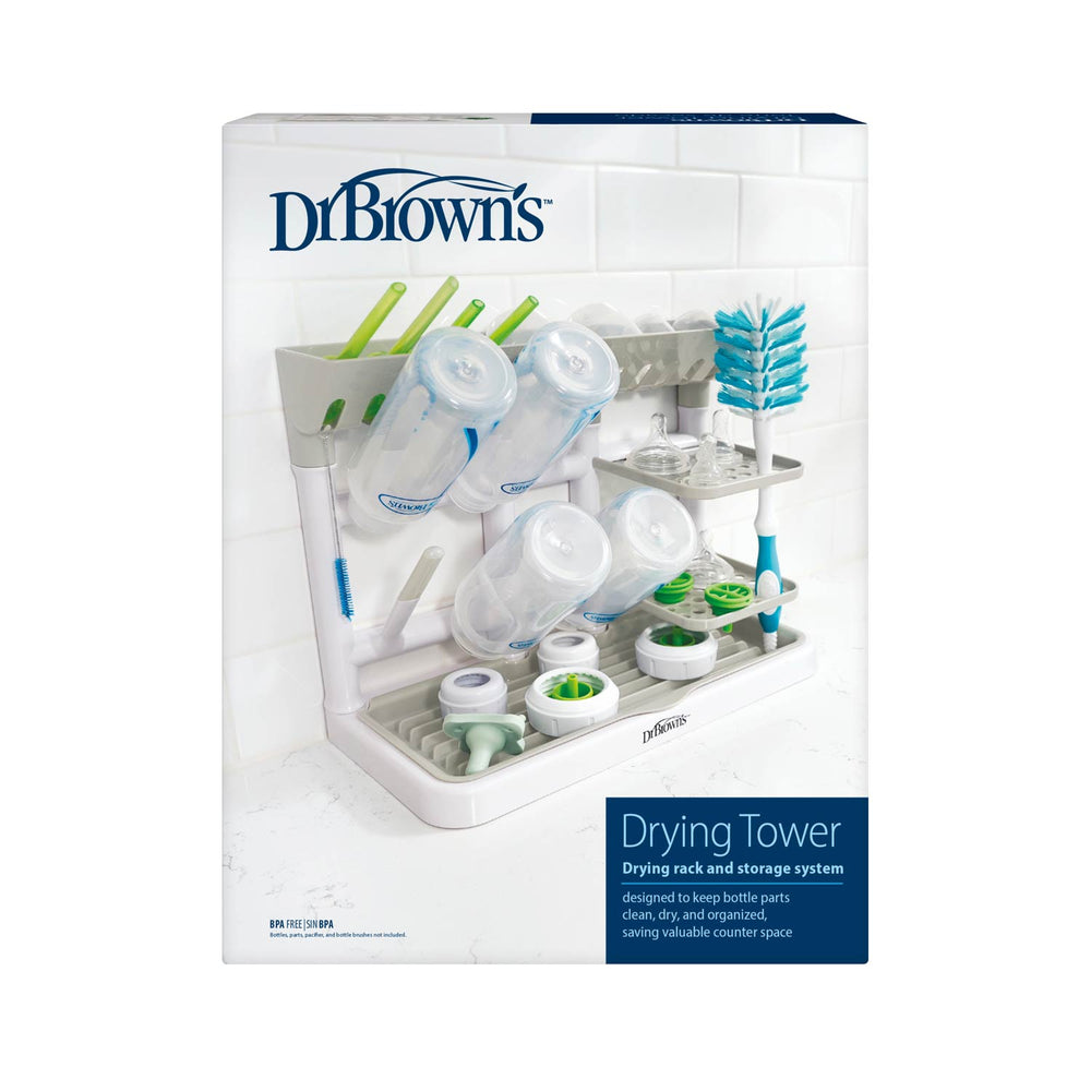 Dr. Brown's Drying Tower bottle and cup dryer in its retail packaging, featuring a white and gray design with a clear depiction of baby bottles, cups, and brushes on the front.