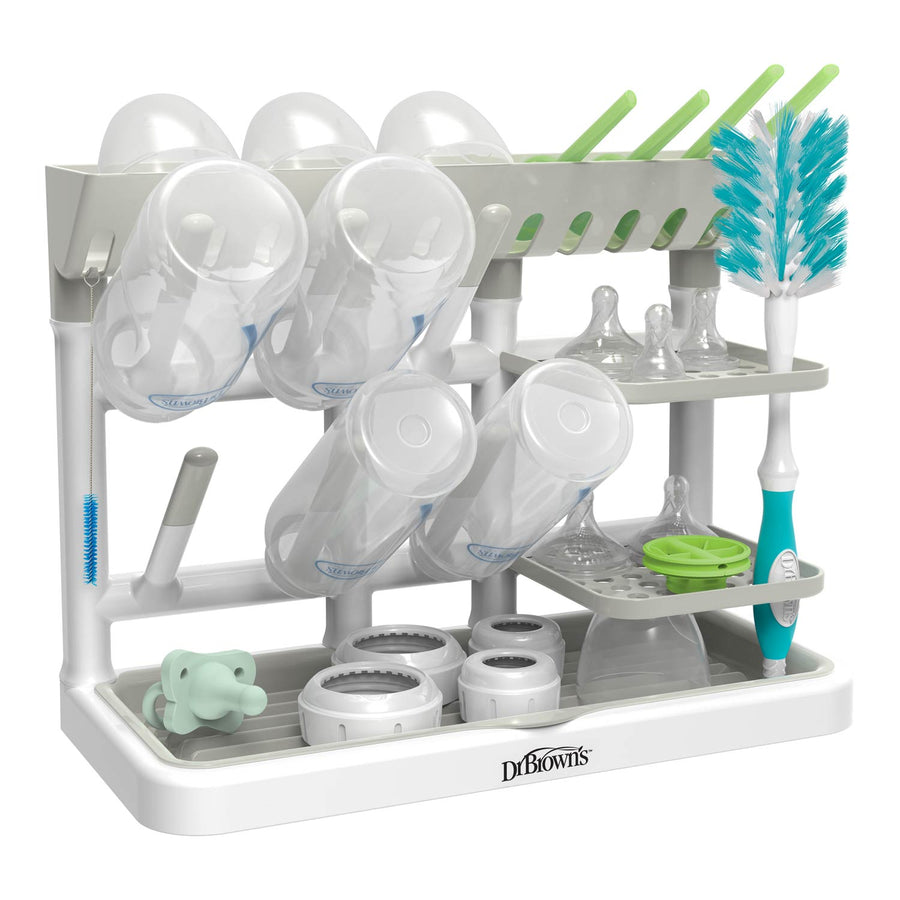 Dr. Brown's gray baby bottle drying rack with cups, bottles, and brushes