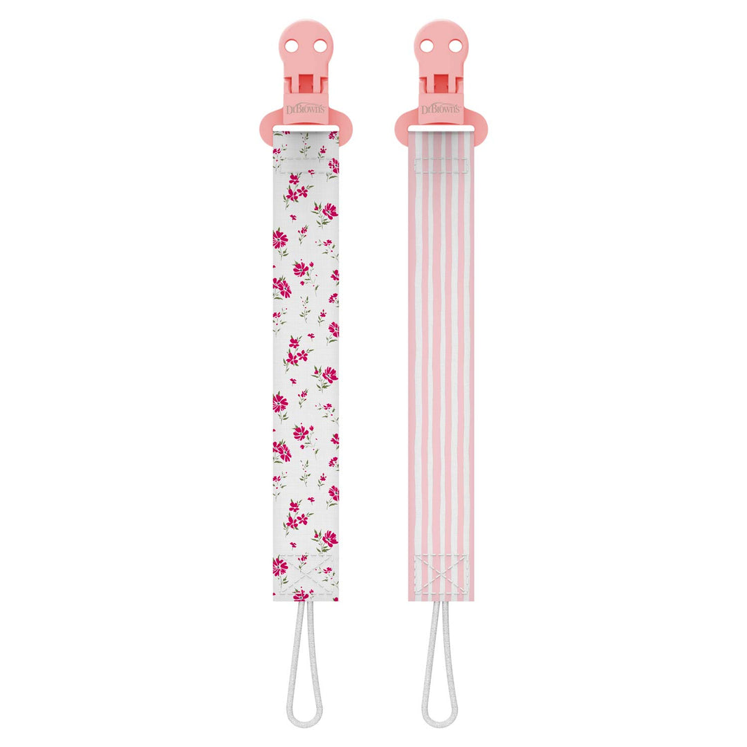 Two pink pacifier clips, one with floral pattern and one with stripes.