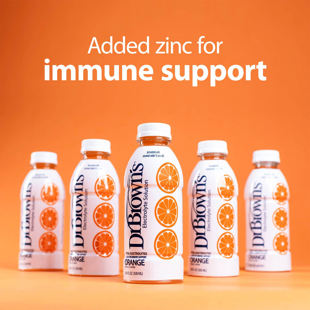 Five Dr. Brown's electrolyte solution bottles in orange flavor are lined up against a solid orange background with the text 'Added zinc for immune support' above them.