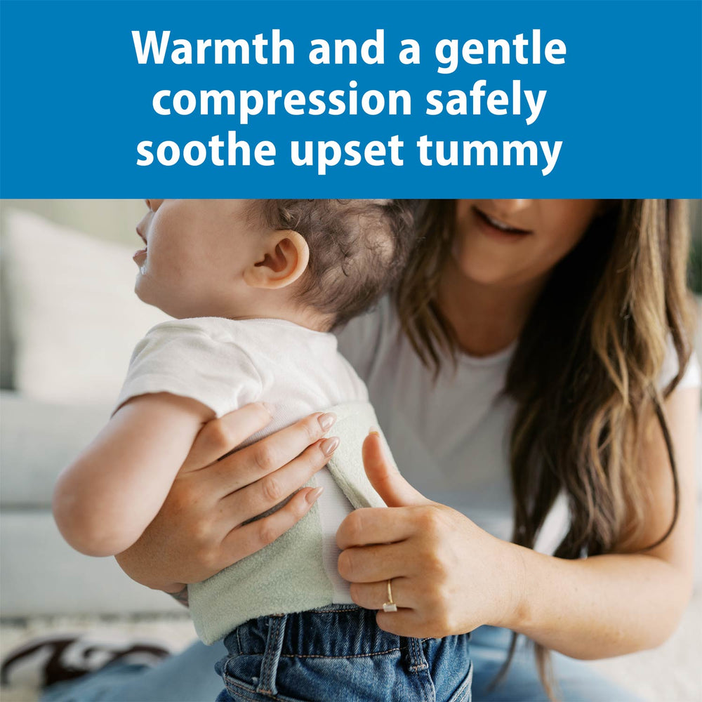 Woman holding a baby with text about warmth and compression for an upset tummy.