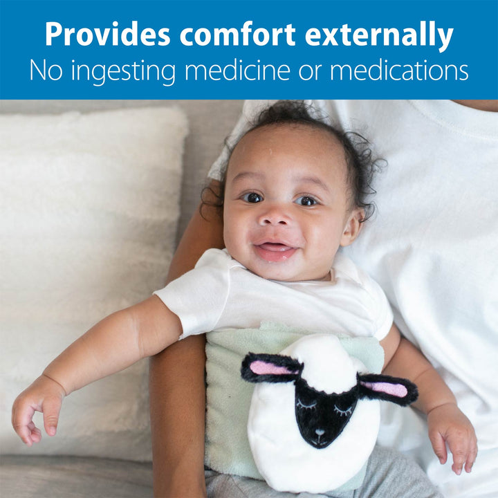 Baby holding a sheep plush toy with text about comfort externally and no ingesting medicine.