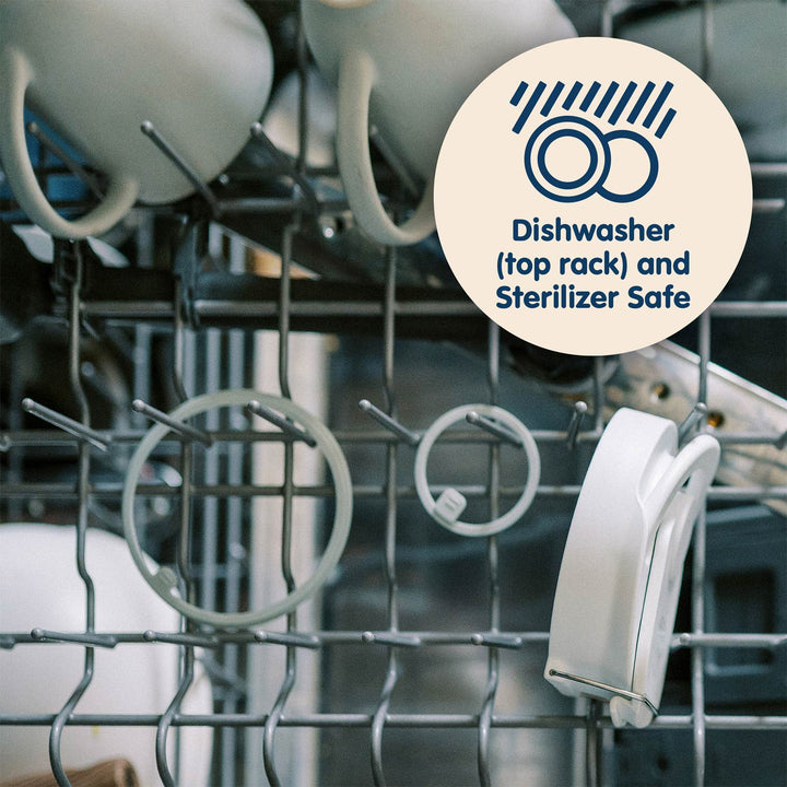 Dishwasher top rack with two silicone rings inside and a label indicating safety for dishwasher and sterilizer use.