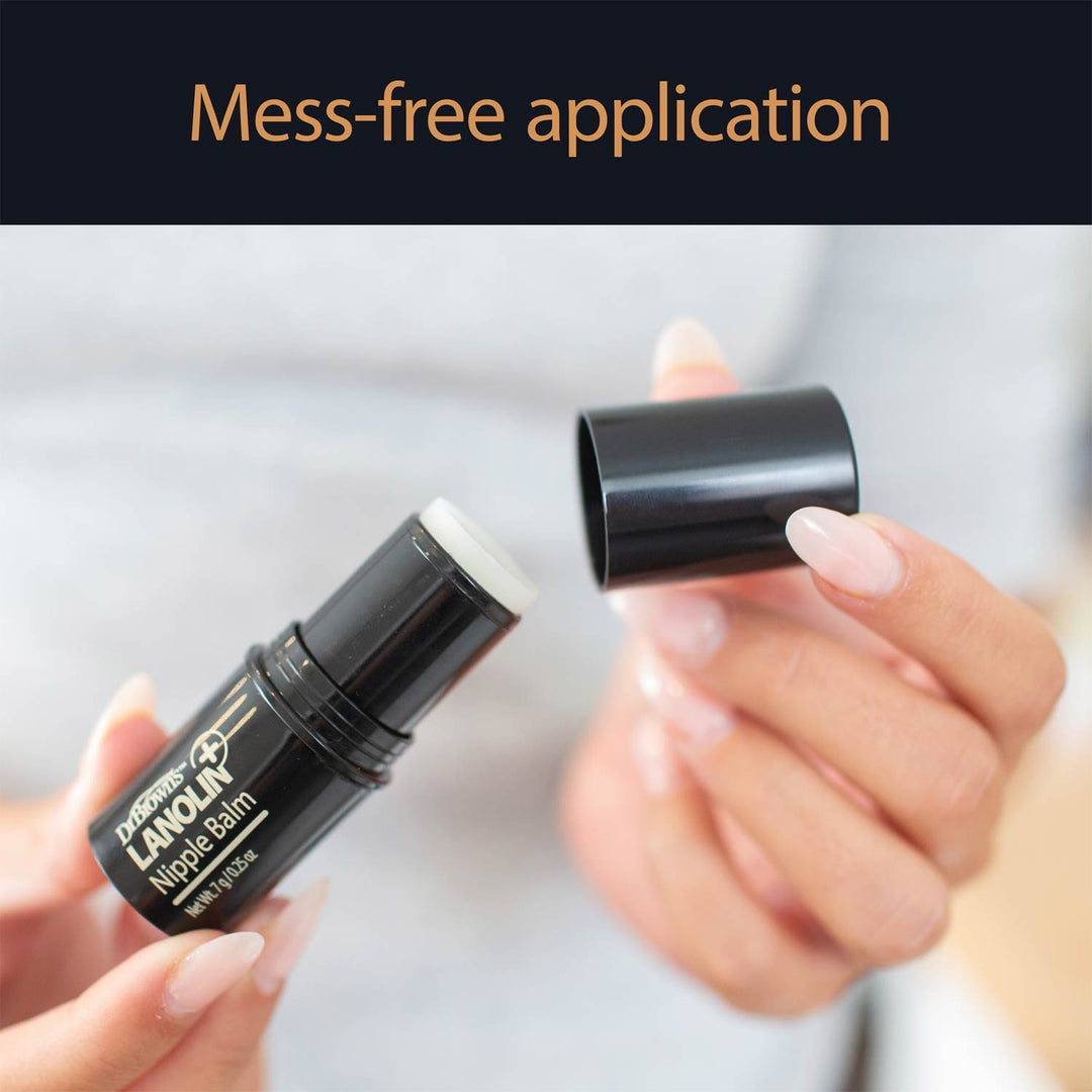 Open Lanolin Nipple Balm container.