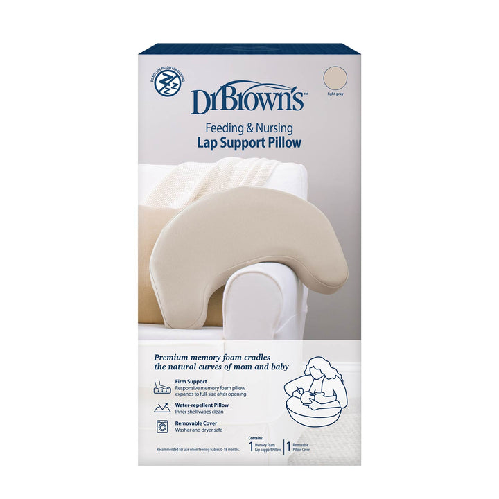 Box of Dr. Brown's™ Feeding & Nursing Lap Support Pillow by Dr. Brown's, showing a crescent-shaped beige pillow on an armchair with illustrations of its comfortable breastfeeding support uses.