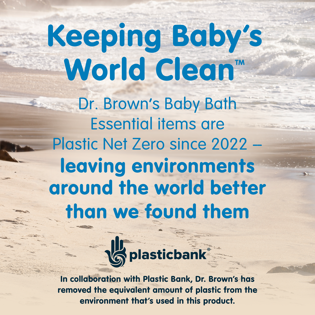 Text on a beach scene promotes Dr. Brown's™ CleanUp™ Float & Hatch Dino Eggs as Plastic Net Zero, featuring playful nesting bath toys shaped like dino eggs and a partnership logo from Plastic Bank.