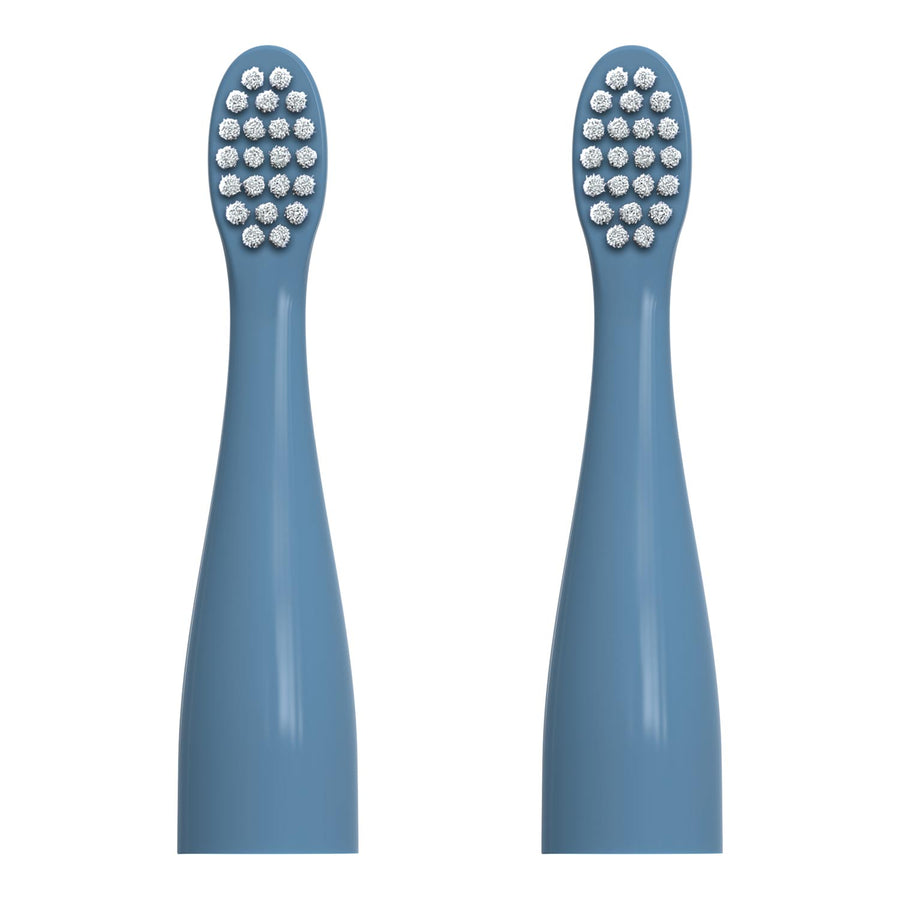 Two replacement electric toothbrush heads in a dusty blue color, shown side-by-side against a plain white background.