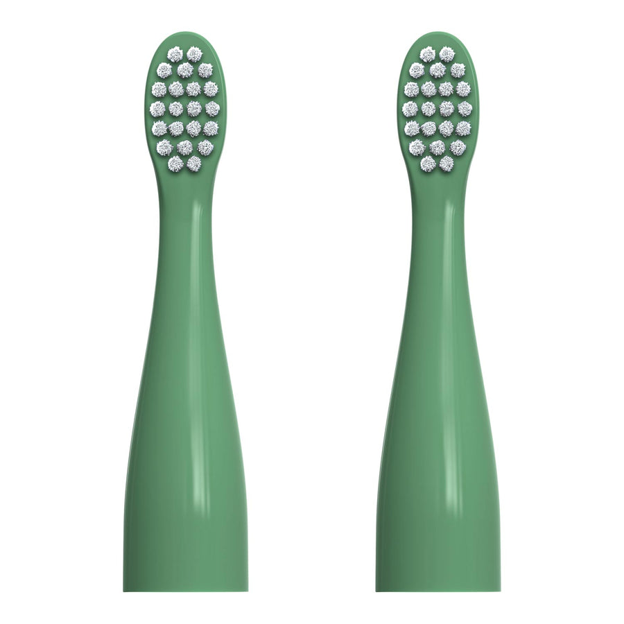Two green replacement electric toothbrush heads with white bristles, shown side by side on a plain white background.
