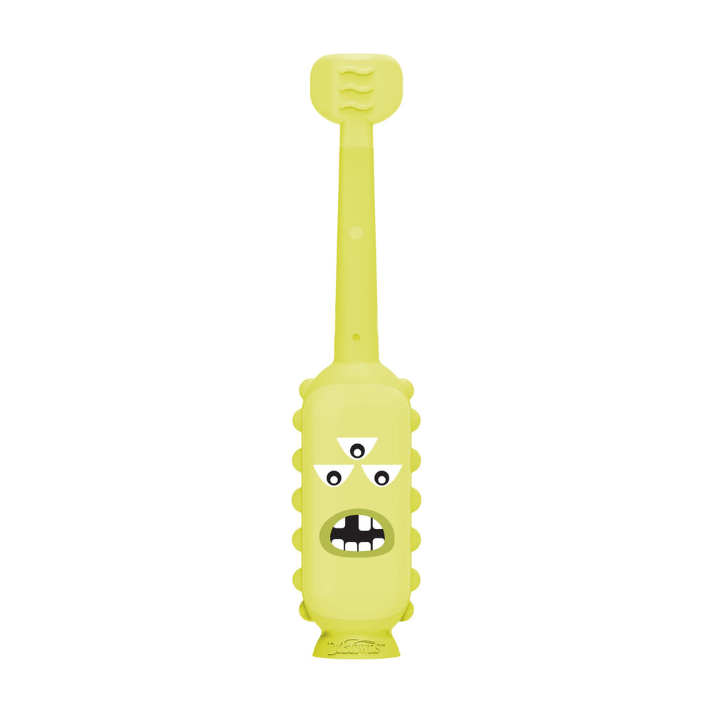Dr. Brown's™ ToothScrubber™ Toddler Toothbrush features a yellow handle with a three-eyed cartoon monster face, an open mouth with two teeth, and color-changing bristles to make brushing fun and guide kids for better dental care.