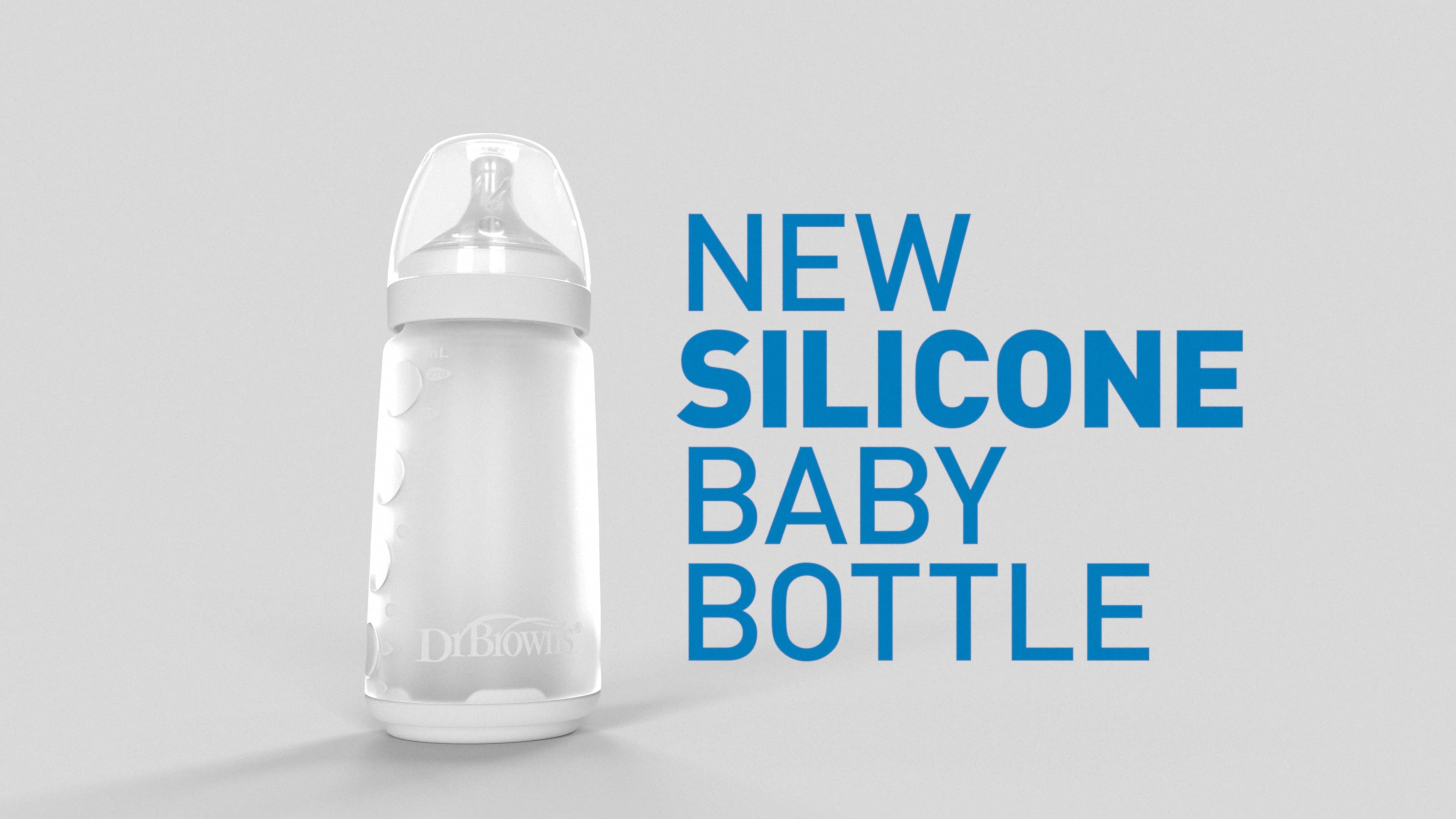 Dr. Brown's Silicone baby bottle with text saying "NEW SILICONE BABY BOTTLE" on a gray background