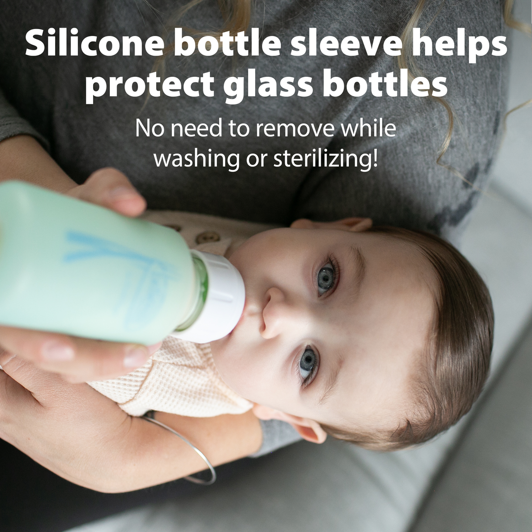 Baby drinking from a bottle with a silicone sleeve, text about its benefits.