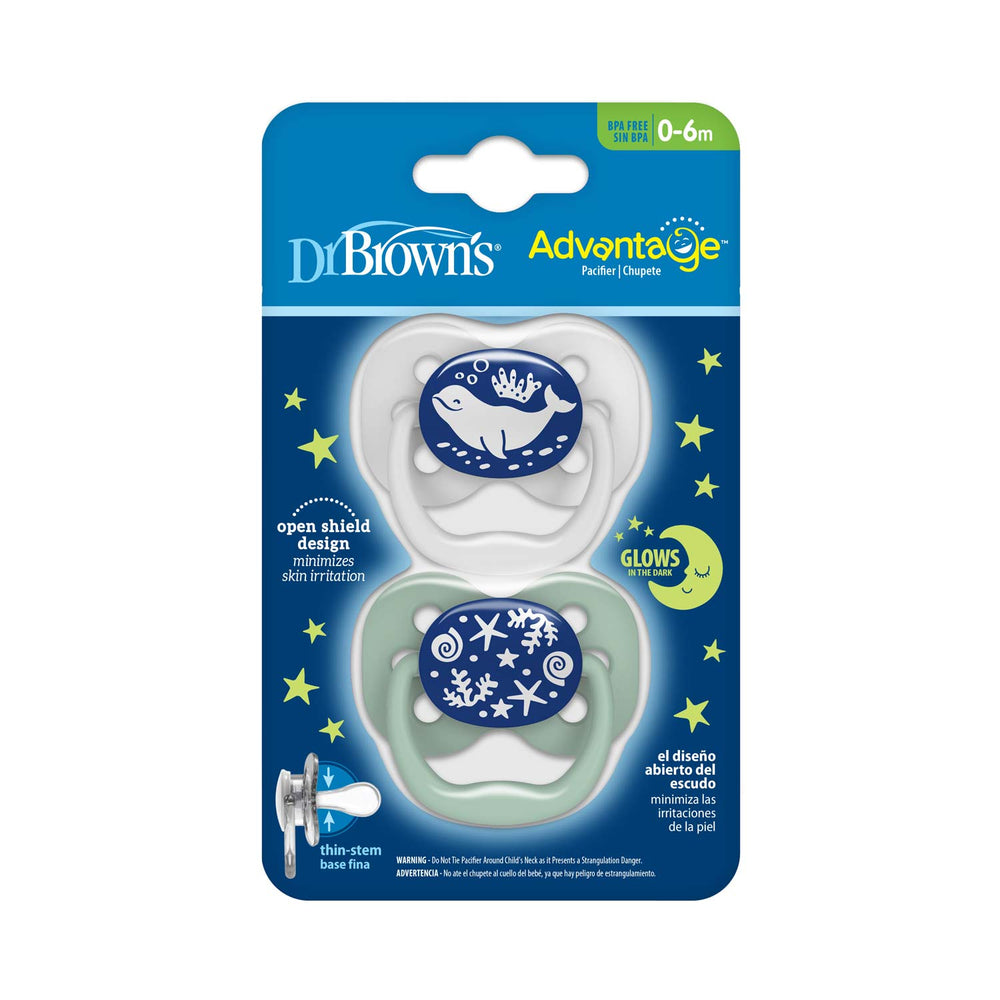 Dr. Brown's™ Advantage™ Glow-in-the-Dark Pacifiers, for 0-6 months, include two pacifiers: a whale design and a stars and planets design. They feature a symmetrical soother for comfort, and instructions are in English and Spanish.