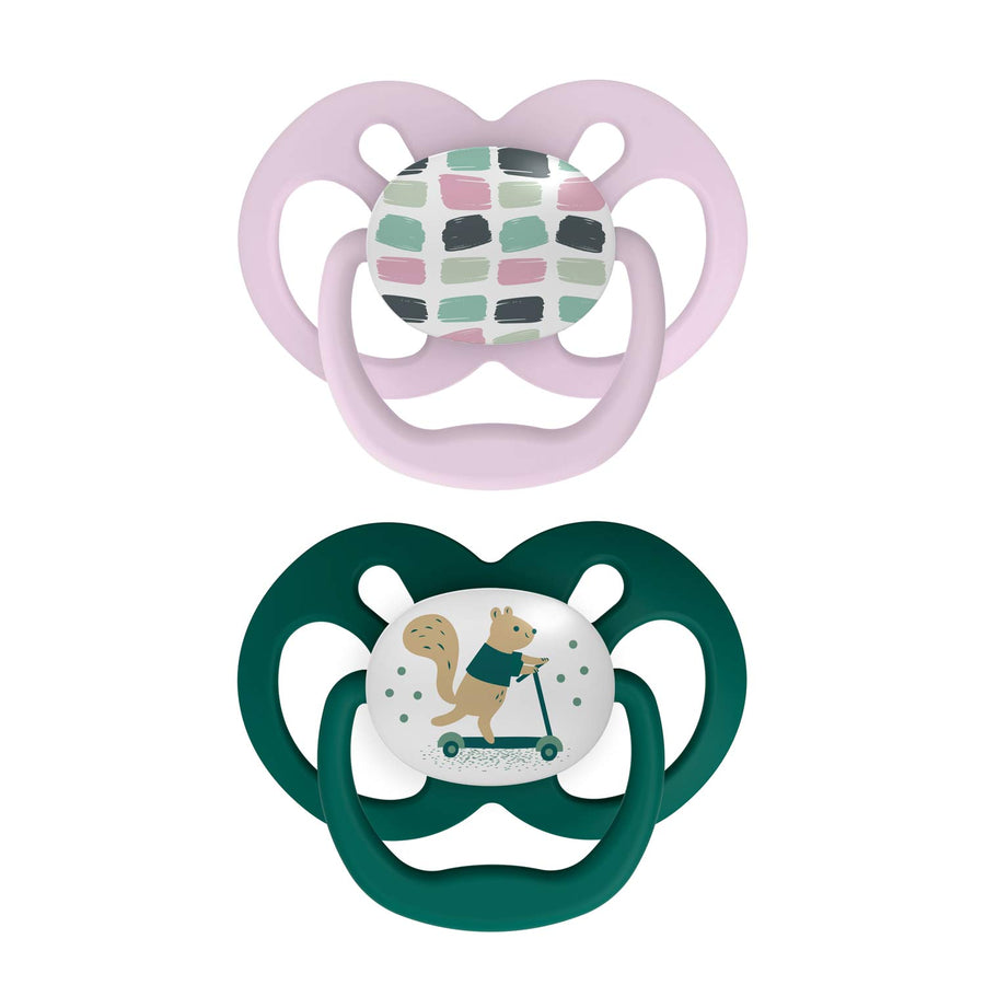 Advantage Pacifiers, green and pink, with a squirrel on a scooter and colored rectangles
