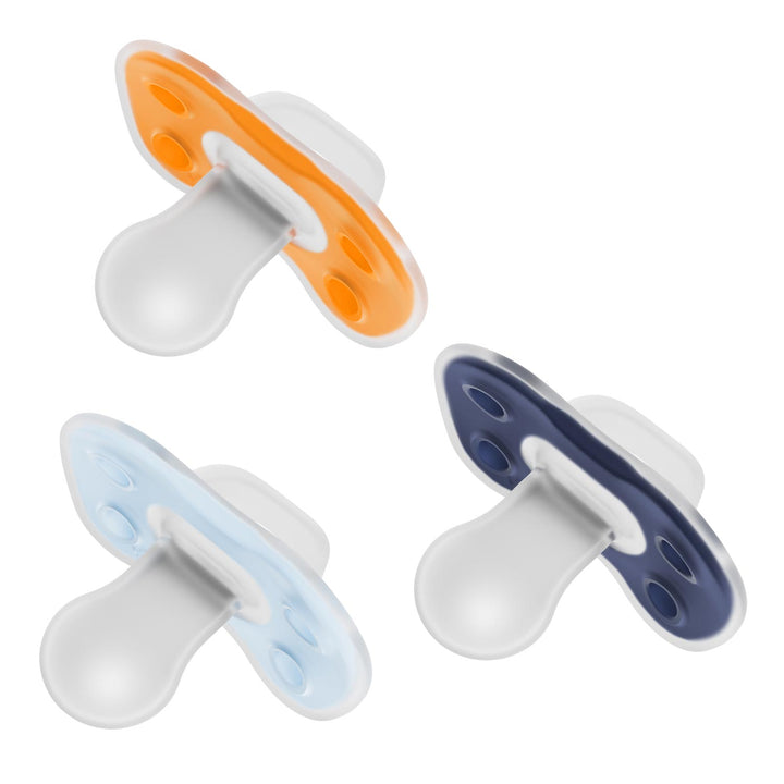 Dr. Brown's® Advantage™ One-Piece Silicone Pacifier – 3-Pack features orange, light blue, and dark blue oval shields with two holes each to protect your baby's skin, all arranged on a white background.