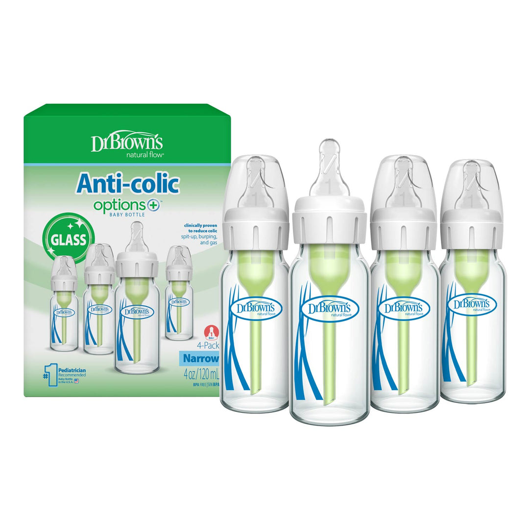 A set of four Dr. Brown's Anti-colic options+ 4-in-1 glass baby bottles with white caps and green inner liners, shown next to their green and white retail packaging box on a white background.