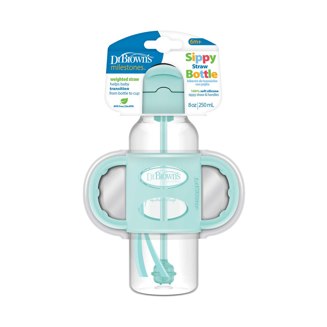 Image of Dr. Brown’s™ Milestones™ Narrow Sippy Straw Bottle with Silicone Handles, featuring a clear design with teal accents. Suitable for 6 months and older, it has a silicone weighted straw and dual handles to aid independent drinking skills, holding 8 oz/250 mL.