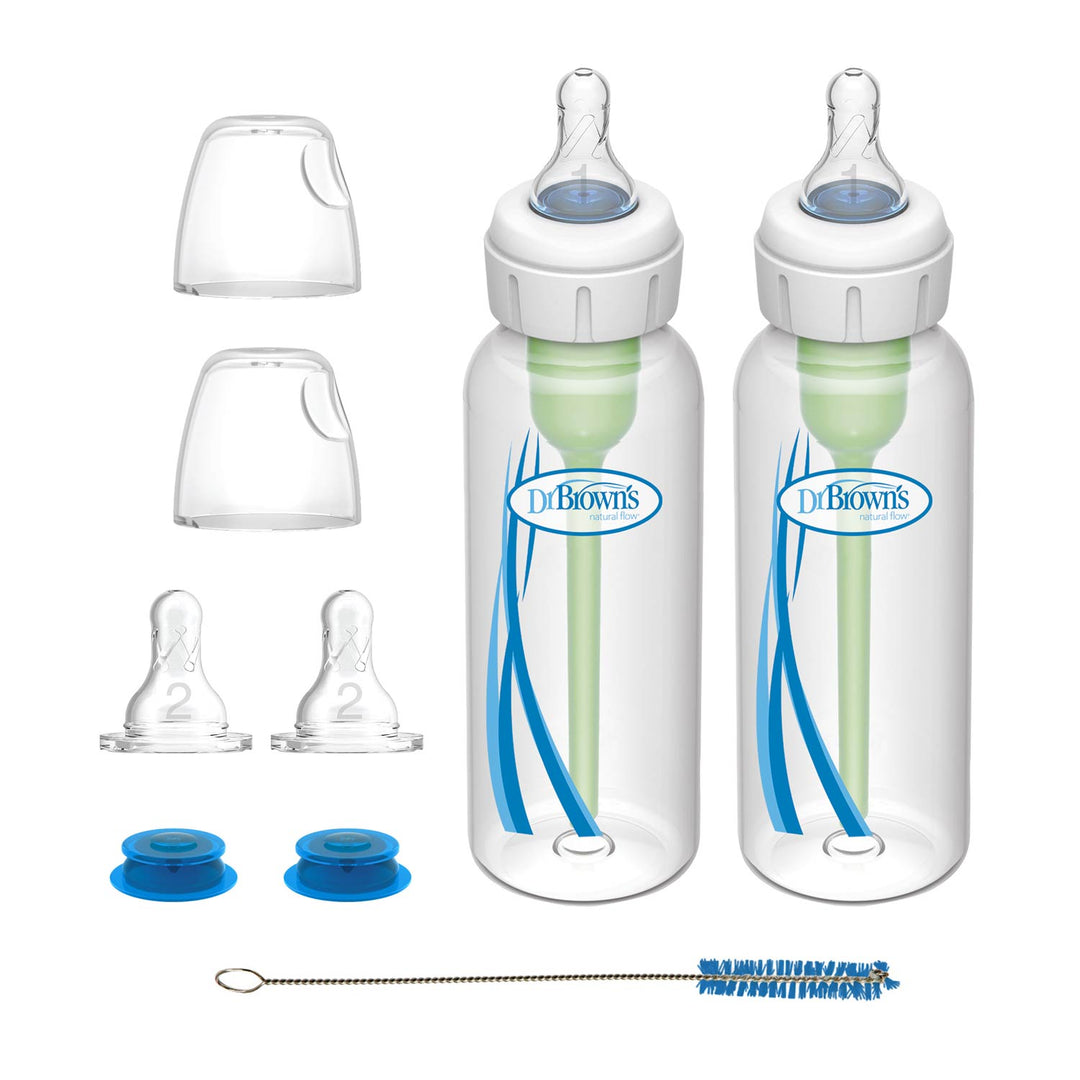 Dr. Brown’s® Specialty Feeding System, 2 Count, includes bottles with green vents, extra nipples, caps, travel disks, nipple covers, and a cleaning brush—ideal for managing and supporting effective oral feeding.
