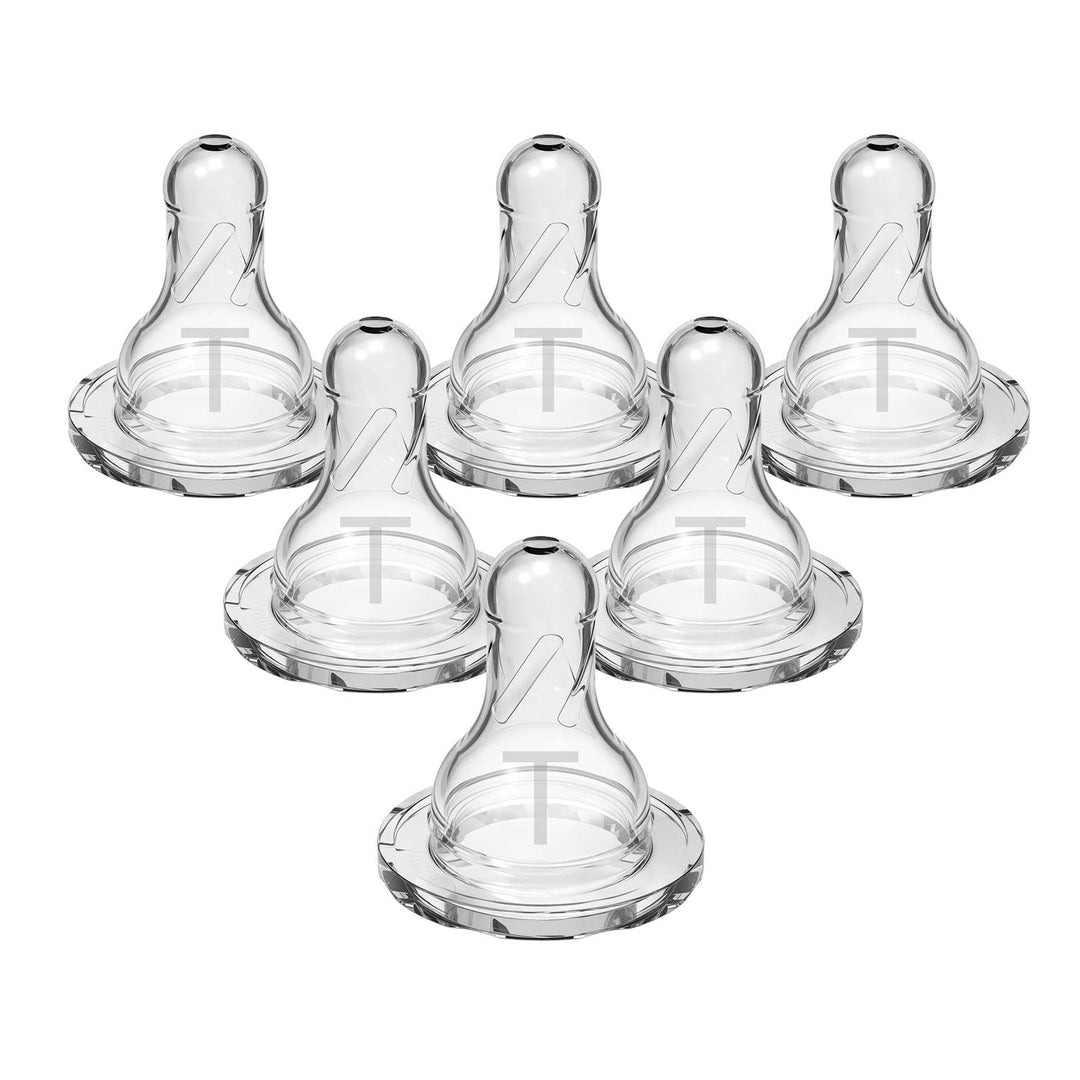 Six Dr. Brown’s™ Medical – Narrow Bottle Nipples made of 100% silicone are arranged upright in two rows on a white background, with their tops facing upward. These identical nipples are designed for Dr. Brown’s Narrow Bottles.