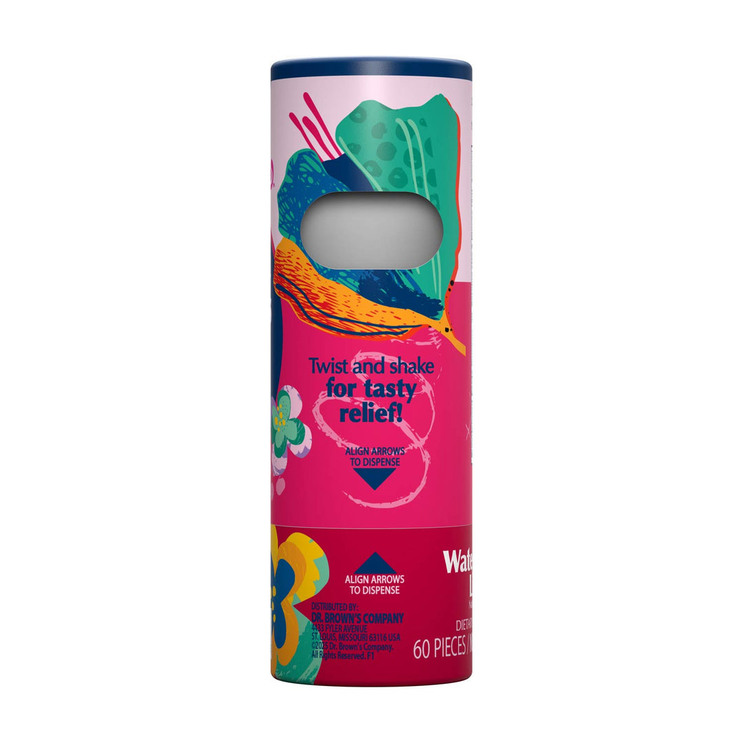A cylindrical cardboard package for Dr. Brown's Watermelon Lime flavored Nausea Candies, featuring a bright pink label with colorful abstract illustrations and a die-cut window showing the arrows inside.