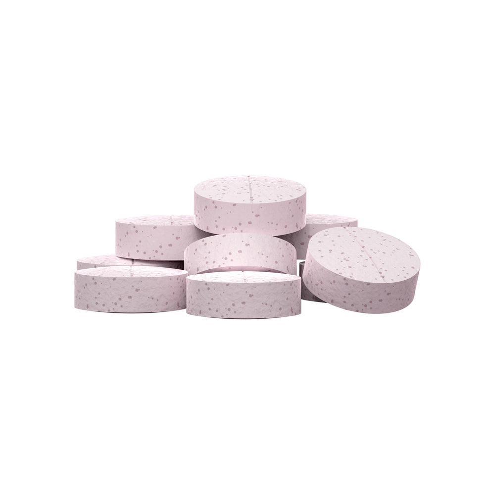 A stack of round, Watermelon Lime flavored Nausea Candies
