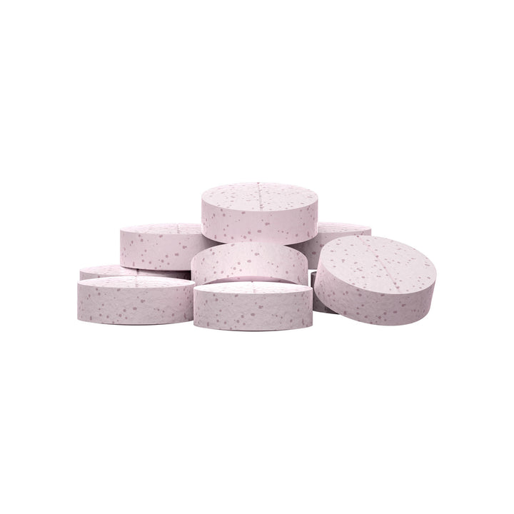A stack of round, Watermelon Lime flavored Nausea Candies