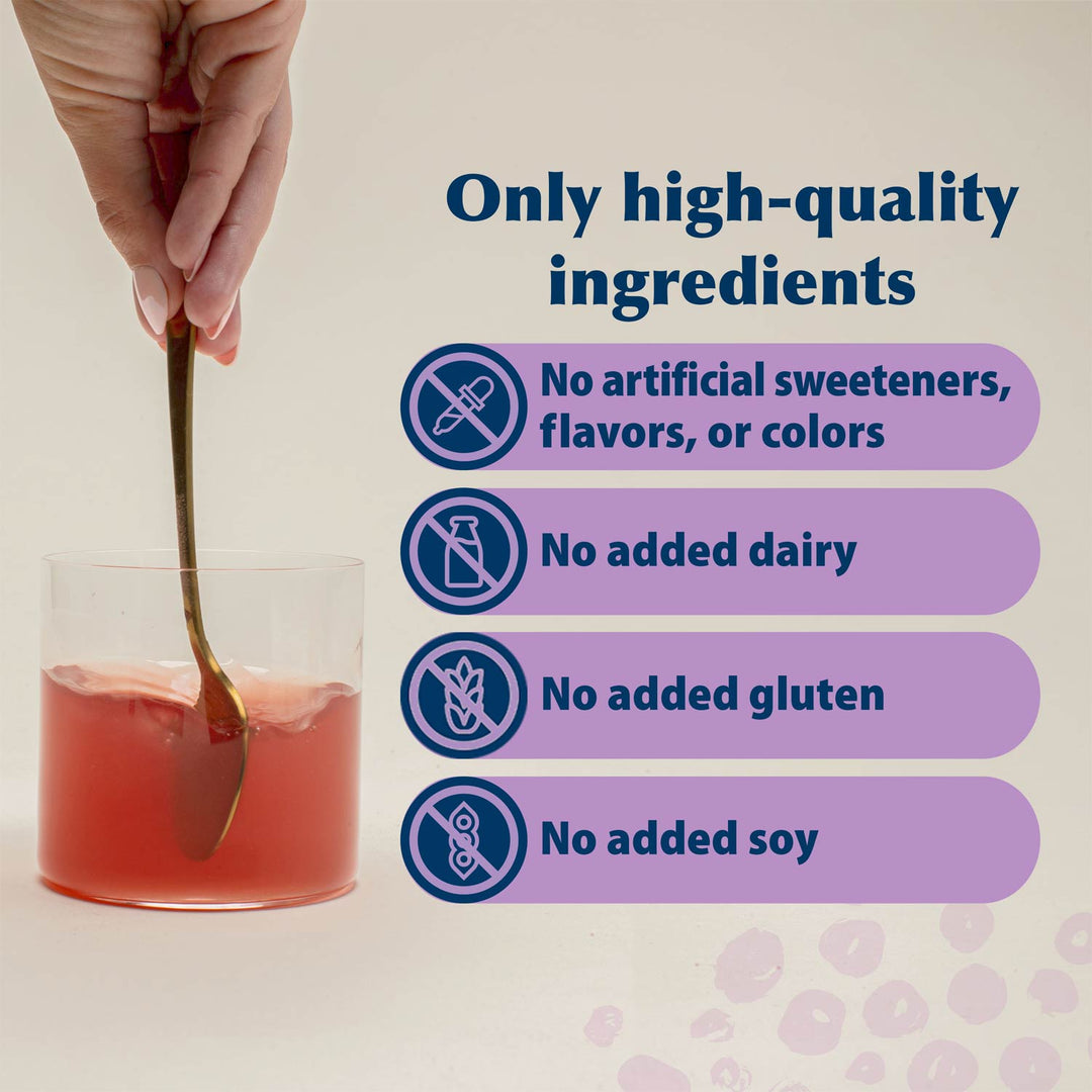 A hand holds a spoon over a glass of pink liquid on a light beige background, with text listing product benefits: only high-quality ingredients, no artificial sweeteners/flavors/colors, no added dairy, no added gluten, and no added soy.