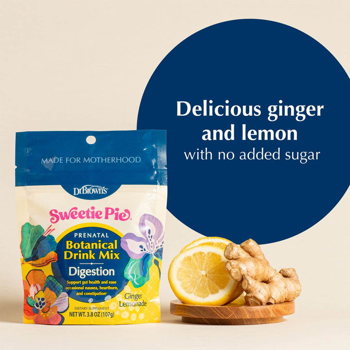 A package of Dr. Brown's Sweetie Pie Prenatal Botanical Drink Mix in Ginger Lemonade flavor is shown on a beige background with a blue graphic circle and text reading 'Delicious ginger and lemon with no added sugar.