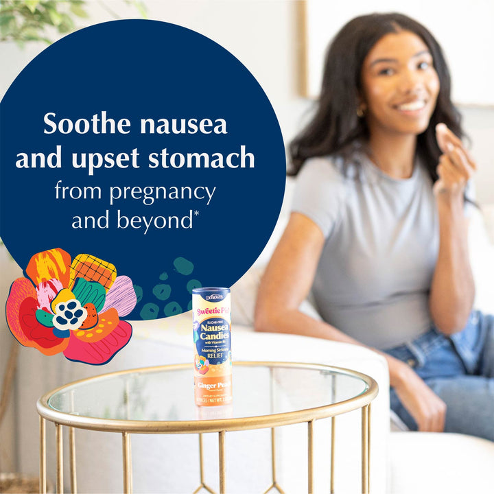 A woman sits in a bright indoor setting with a small bottle of Sweetie Pie's  Nausea Candies supplement placed on a round glass table in the foreground.