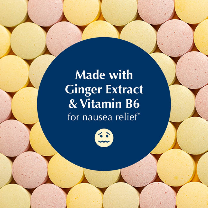 A close-up background of round pastel tablets in pale yellow and pink, overlaid with a large dark blue circle containing white text that reads, 'Made with Ginger Extract & Vitamin B6 for nausea relief' and a small nauseated face icon.