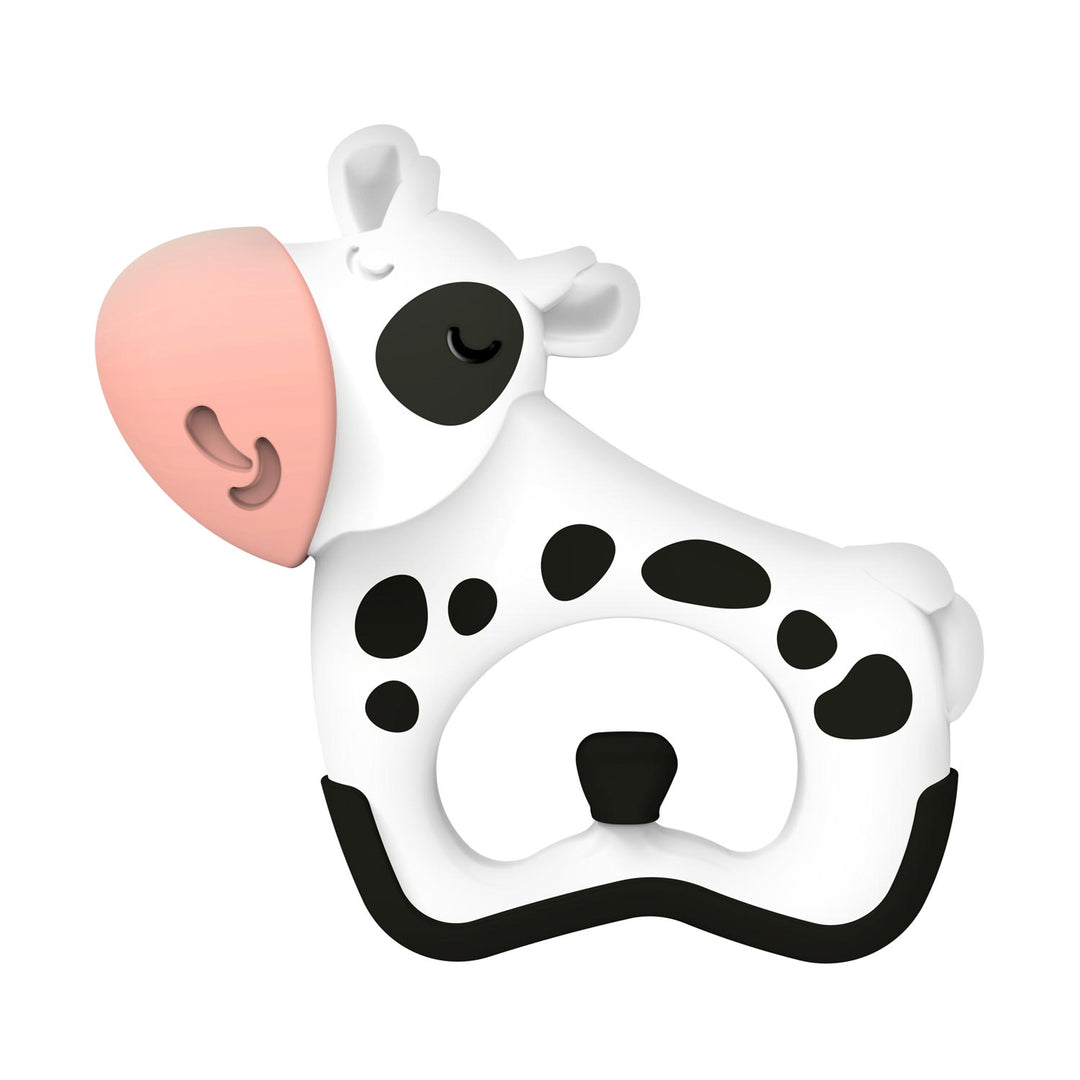 A cow-shaped baby teething toy or pacifier clip with a white body, black spots, a pink nose, and a black outline, shown on a plain white background.