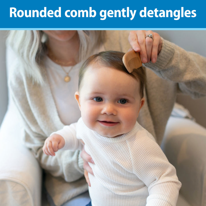 Baby being combed by a person with text 'Rounded comb gently detangles' on a blue background