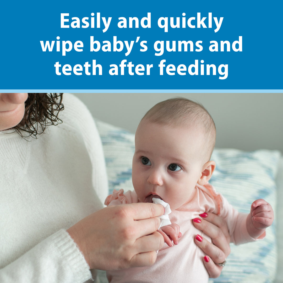 Baby being fed with a Dr. Brown's Tooth and Gum Wipe, with text about easily and quickly wiping baby's gums and teeth after feeding.